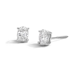 0.50 CT. T.W. Oval Certified Lab-Grown Diamond Solitaire Stud Earrings in 14K White Gold (F/SI2)
