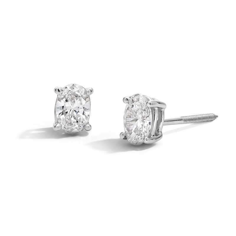 Main Image 1 of 0.50 CT. T.W. Oval Certified Lab-Grown Diamond Solitaire Stud Earrings in 14K White Gold (F/SI2)