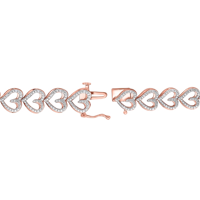 0.23 CT. T.W. Diamond Sideways Heart Link Bracelet in 10K Rose Gold