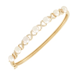 5.5-6.0mm Button Freshwater Cultured Pearl and 0.23 CT. T.W. Diamond “XO” Bangle in 10K Gold