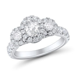 1.95 CT. T.W. Oval and Round Diamond Frame Three Stone Engagement Ring in 14K White Gold