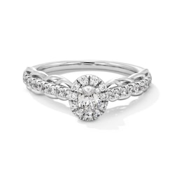 0.50 CT. T.W. Oval Diamond Frame Scallop Shank Engagement Ring in 10K White Gold