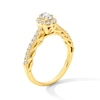 0.50 CT. T.W. Oval Diamond Frame Scallop Shank Engagement Ring in 10K Gold