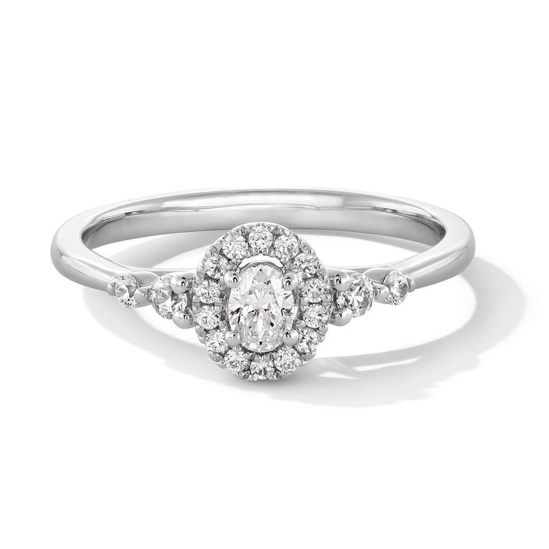 Main Image 1 of 0.30 CT. T.W. Oval Certified Lab-Grown Diamond Frame Promise Ring in 10K White Gold (F/VS2)