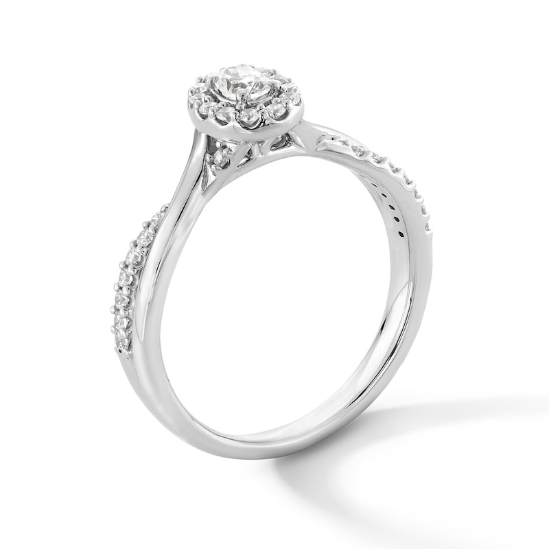 Main Image 2 of 0.30 CT. T.W. Oval Certified Lab-Grown Diamond Frame Crossover Shank Promise Ring in Sterling Silver (F/VS2)