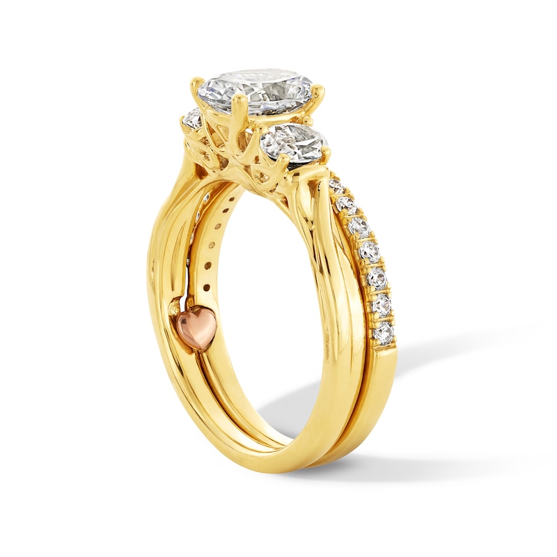 Perfect Fit 1.75 CT. T.W. Oval Certified Lab-Grown Diamond Three Stone Twist Shank Bridal Set in 14K Gold (F/VS2)