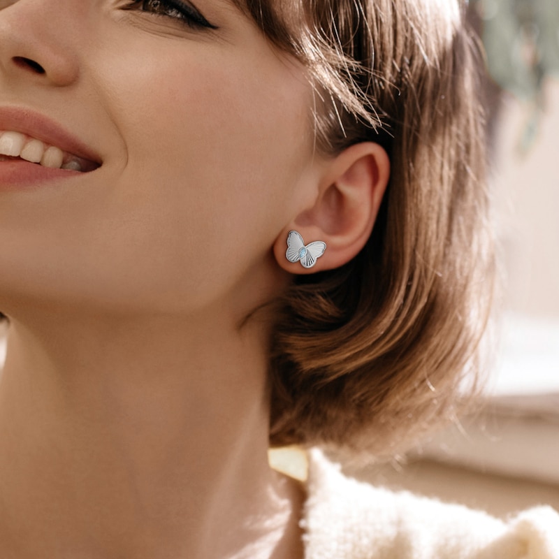 Marquise-Cut Sky Blue Topaz Butterfly Stud Earrings in Sterling Silver