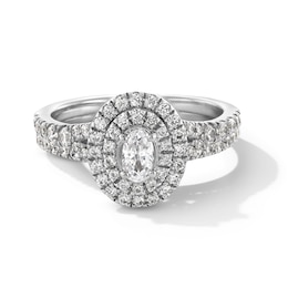 1.00 CT. T.W. Oval Canadian Certified Centre Diamond Double Frame Bridal Set in 14K White Gold (I/I1)