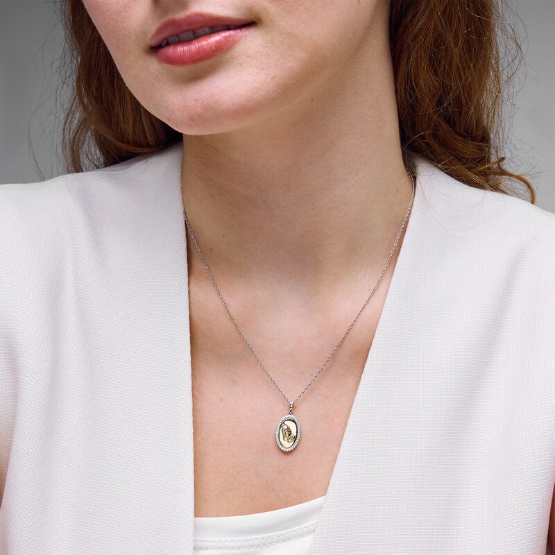 0.23 CT. T.W. Diamond Praying Hands with Rosary Oval Frame Pendant in Sterling Silver and 10K Gold