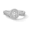 Thumbnail Image 1 of 1.00 CT. T.W. Oval Canadian Certified Centre Diamond Double Frame Bypass Bridal Set in 14K White Gold (I/I1)