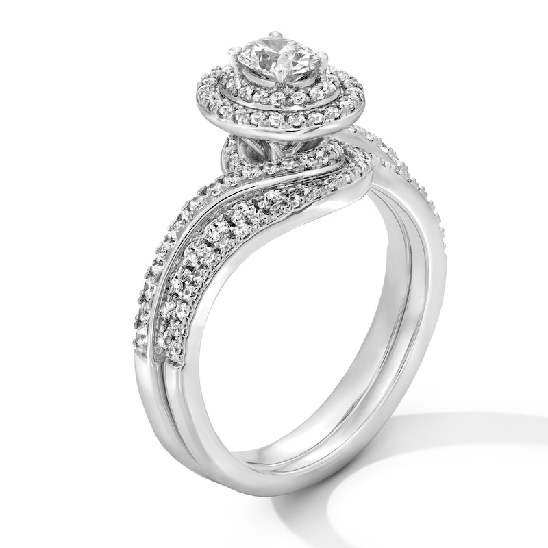 Main Image 2 of 1.00 CT. T.W. Oval Canadian Certified Centre Diamond Double Frame Bypass Bridal Set in 14K White Gold (I/I1)
