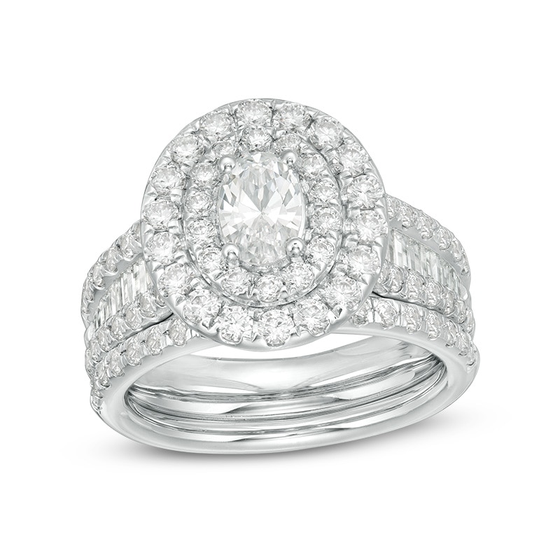 Previously Owned - 2.50 CT. T.W. Certified Canadian Oval Diamond Frame Multi-Row Bridal Set in 14K White Gold (I/SI2)