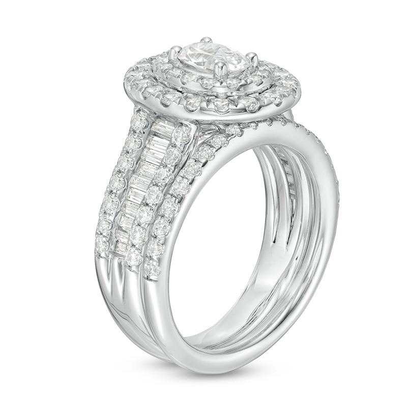 Previously Owned - 2.50 CT. T.W. Certified Canadian Oval Diamond Frame Multi-Row Bridal Set in 14K White Gold (I/SI2)