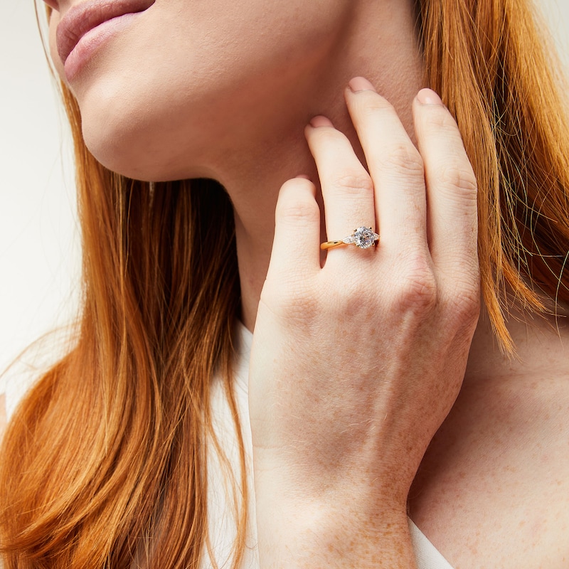 Previously Owned - 1.80 CT. T.W. Pear-Shaped and Round Certified Lab-Grown Diamond Three Stone Engagement Ring in 14K Gold (F/SI2)