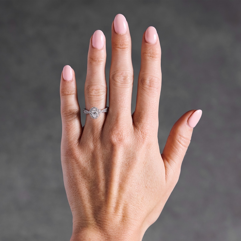 1.00 CT. T.W. Oval Certified Lab-Grown Diamond Frame Engagement Ring 14K White Gold (F/VS2)