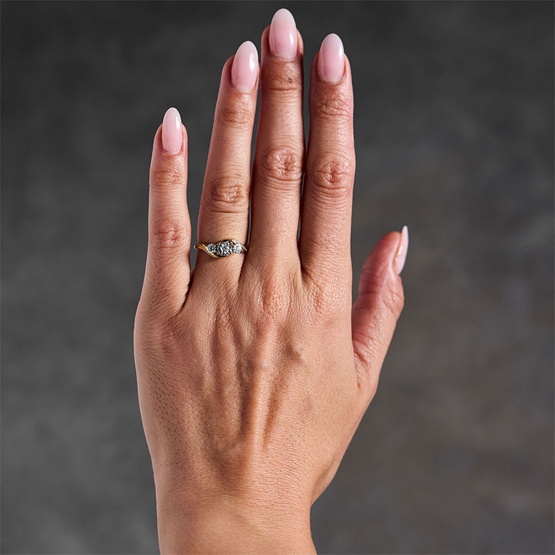 Main Image 2 of 0.20 CT. T.W. Diamond Three-Stone Engagement Ring in 10K Gold (J/I3)