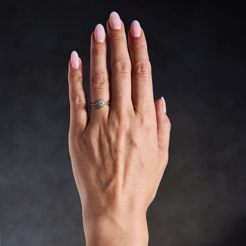 0.33 CT. T.W. Oval Canadian Certified Centre Diamond Engagement Ring 10K Gold (I/SI2