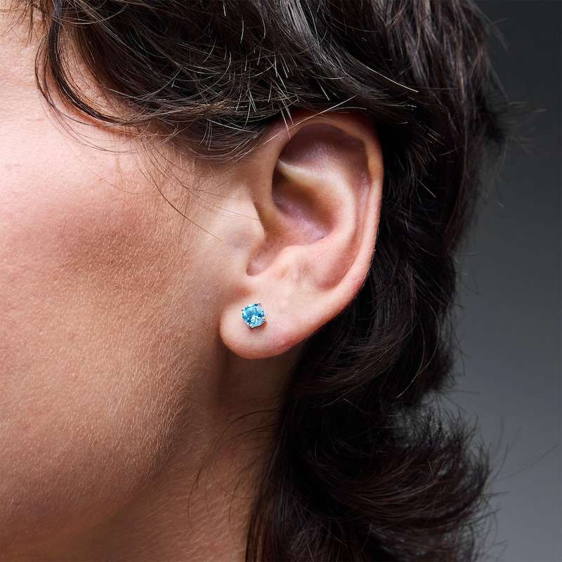 Main Image 2 of Blue Topaz Solitaire Stud Earrings in Sterling Silver