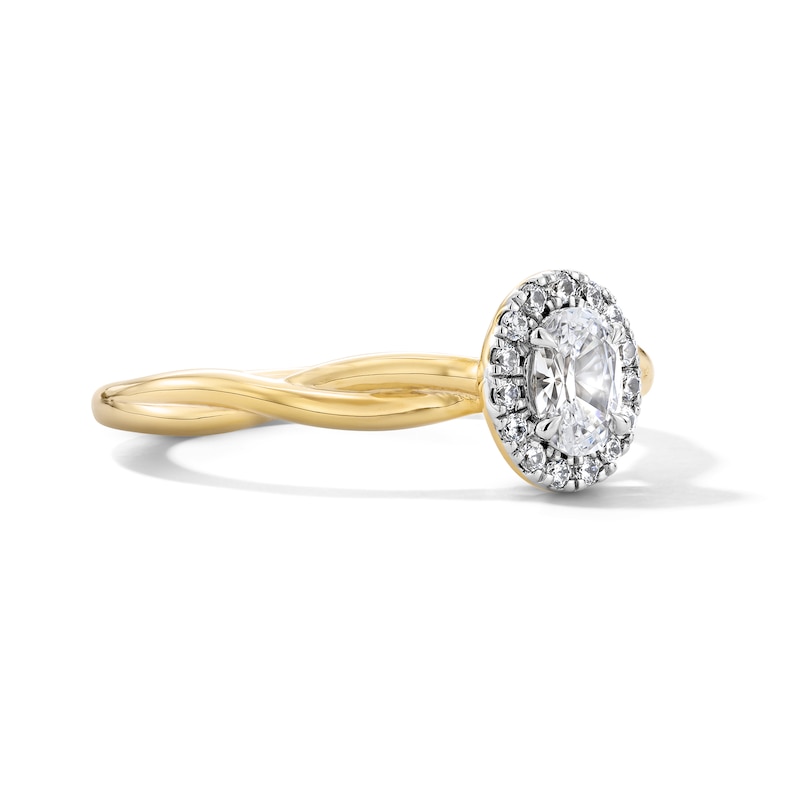 Main Image 4 of 0.40 CT. T.W. Oval Canadian Certified Centre Diamond Frame Engagement Ring in 10K Gold (I/SI2)