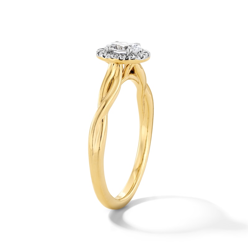 Main Image 5 of 0.40 CT. T.W. Oval Canadian Certified Centre Diamond Frame Engagement Ring in 10K Gold (I/SI2)