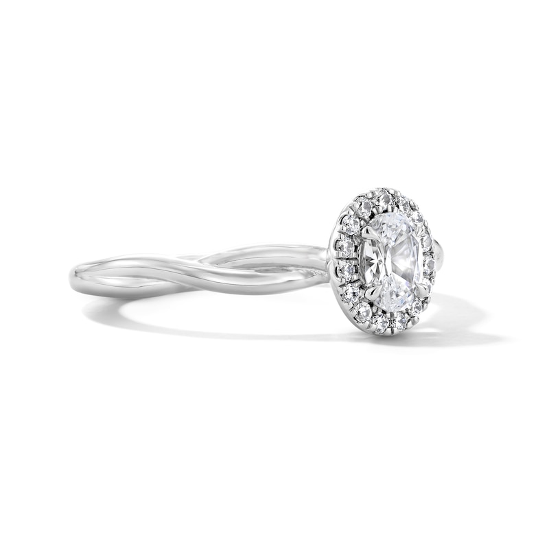 Main Image 4 of 0.40 CT. T.W. Oval Canadian Certified Centre Diamond Frame Engagement Ring in 10K White Gold (I/SI2)