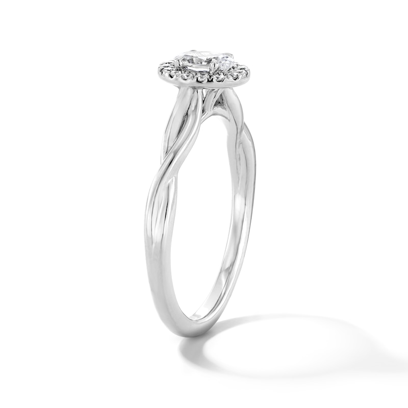 Main Image 5 of 0.40 CT. T.W. Oval Canadian Certified Centre Diamond Frame Engagement Ring in 10K White Gold (I/SI2)