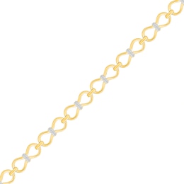 0.18 CT. T.W. Diamond Bow Link Bracelet in Sterling Silver with 24K Gold Vermeil