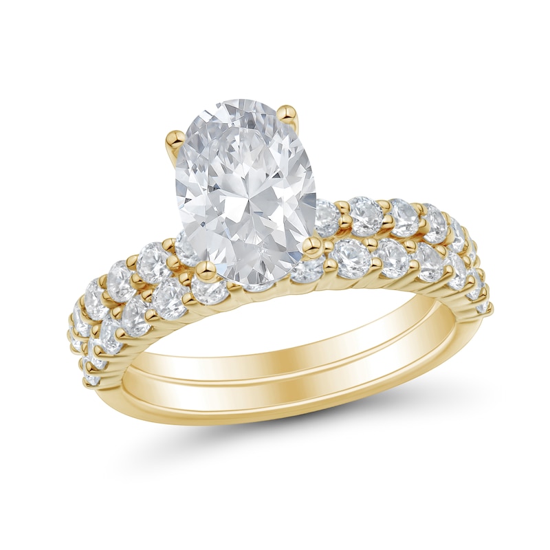 3.00 CT. T.W. Oval Certified Lab-Grown Diamond Bridal Set in 14K Gold (F/VS2)