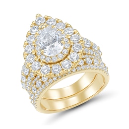 3.95 CT. T.W. Pear-Shaped Certified Lab-Grown Diamond Bridal Set in 14K Gold (F/VS2)