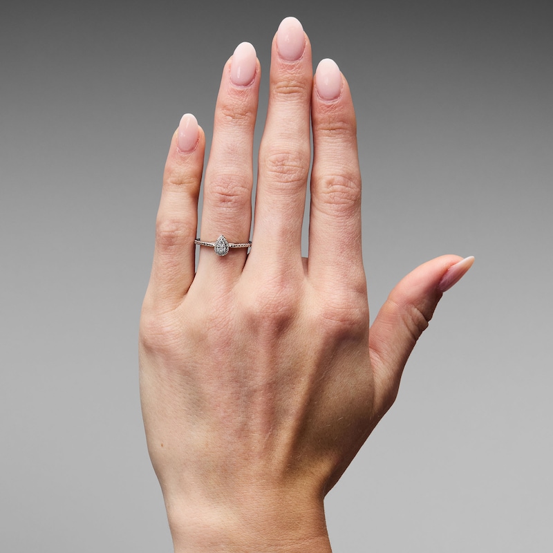 0.05 CT. T.W. Diamond Pear-Shaped Frame Promise Ring in Sterling Silver