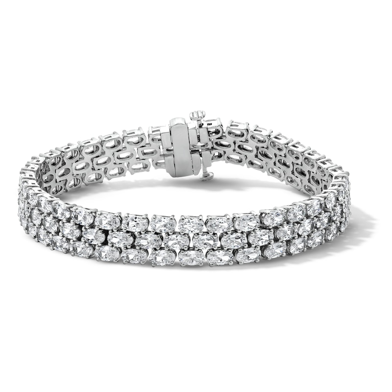 Main Image 1 of 5.0mm Oval White Lab-Created Sapphire Link Triple-Row Bracelet in Sterling Silver - 7.25"