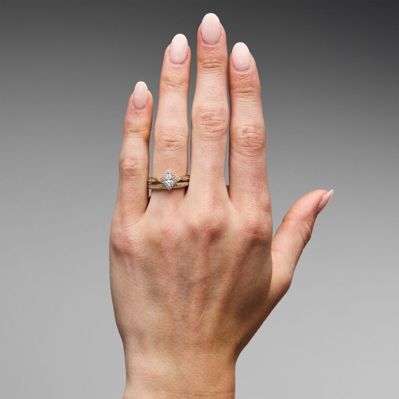 0.70 CT. T.W. Marquise-Cut Diamond Frame Bridal Set in 14K Gold
