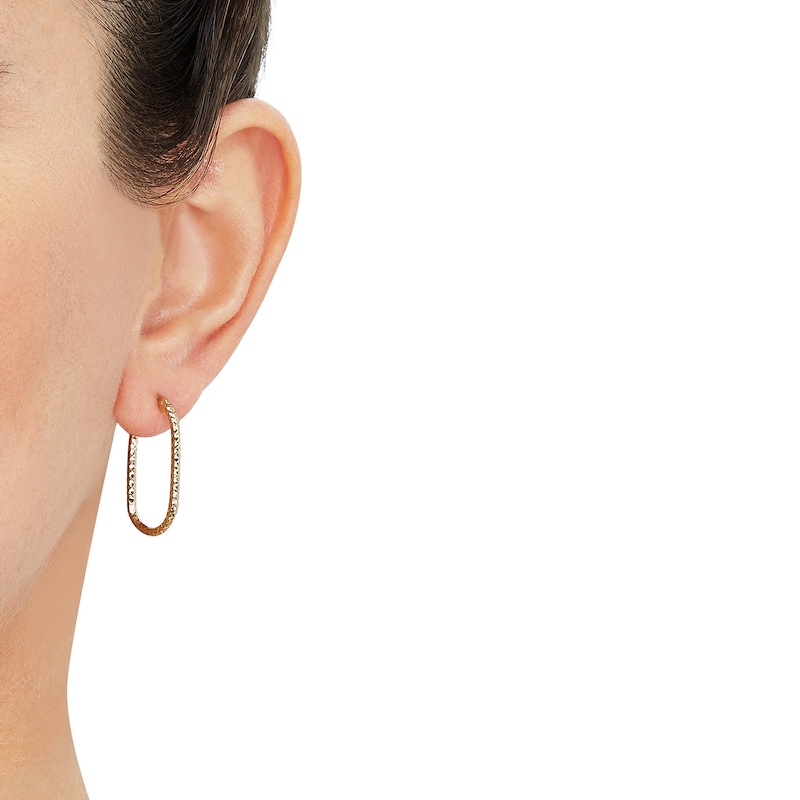 Diamond-Cut Textured Oval Hoop Earrings in Hollow 10K Gold