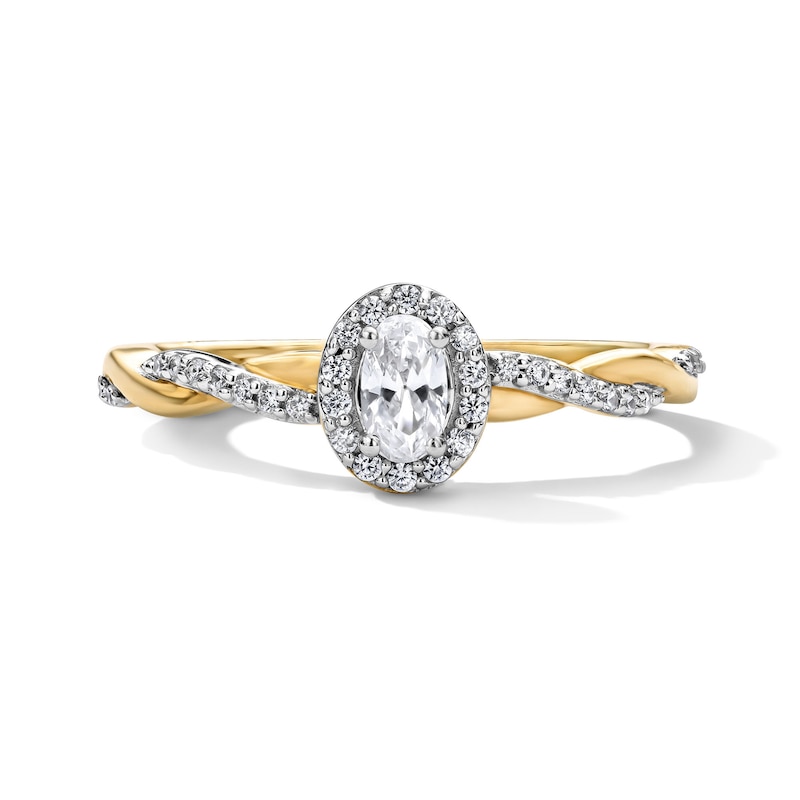 0.35 CT. T.W. Oval Diamond Frame Engagement Ring in 10K Gold