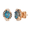 Thumbnail Image 1 of Le Vian® Oval Deep Sea Blue Topaz™ and 0.20 CT. T.W. Diamond Stud Earrings in 14K Strawberry Gold®
