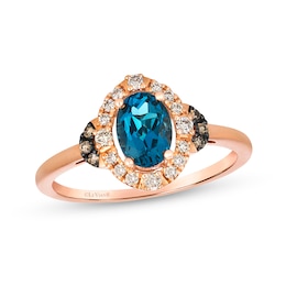 Le Vian® Oval Deep Sea Blue Topaz™ and 0.19 CT. T.W. Diamond Frame Ring in 14K Strawberry Gold®