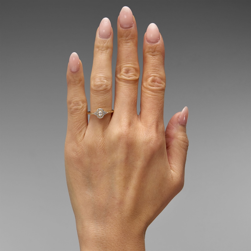 0.20 CT. T.W. Oval Lab-Grown Diamond Halo Promise Ring 10K Gold (F/VS2)