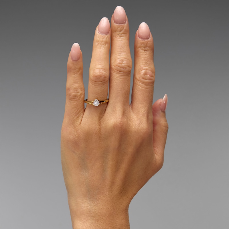0.12 CT. T.W. Diamond Halo Promise Ring 10K Gold
