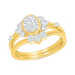 0.95 CT. T.W. Oval Certified Lab-Grown Diamond Starburst Frame Bridal Set in 10K Gold (F/VS2)