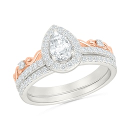 0.95 CT. T.W. Pear-Shaped Certified Lab-Grown Diamond Frame Bridal Set in 10K Two-Tone Gold (F/VS2)