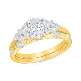1.23 CT. T.W. Oval Certified Lab-Grown Diamond Cluster Bridal Set in 10K Gold (F/VS2)
