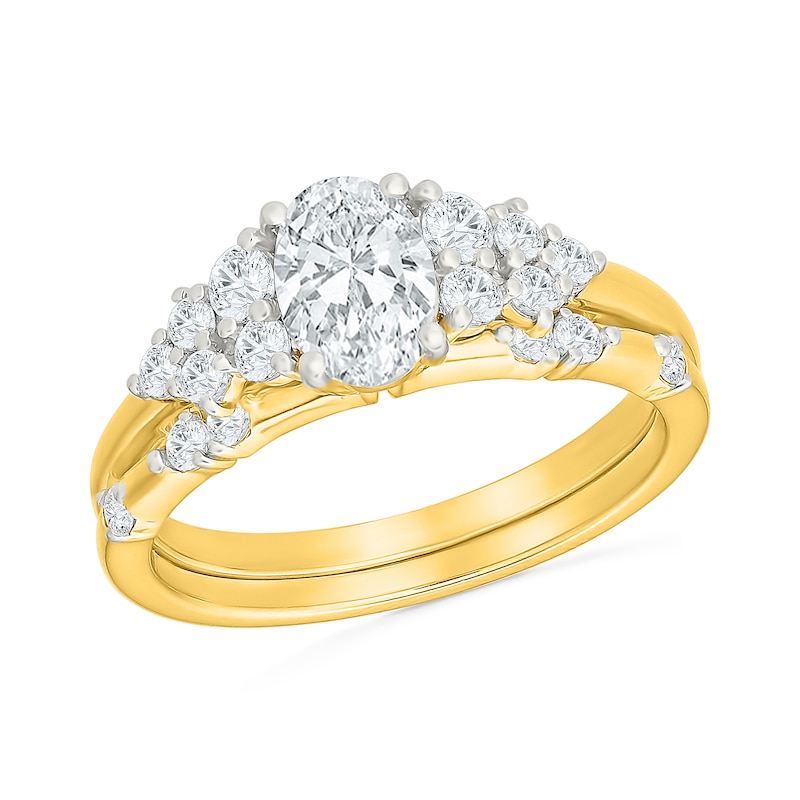 1.23 CT. T.W. Oval Certified Lab-Grown Diamond Cluster Bridal Set 10K Gold (F/VS2)
