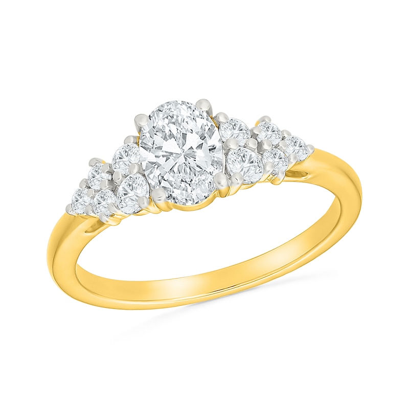 1.23 CT. T.W. Oval Certified Lab-Grown Diamond Cluster Bridal Set 10K Gold (F/VS2)