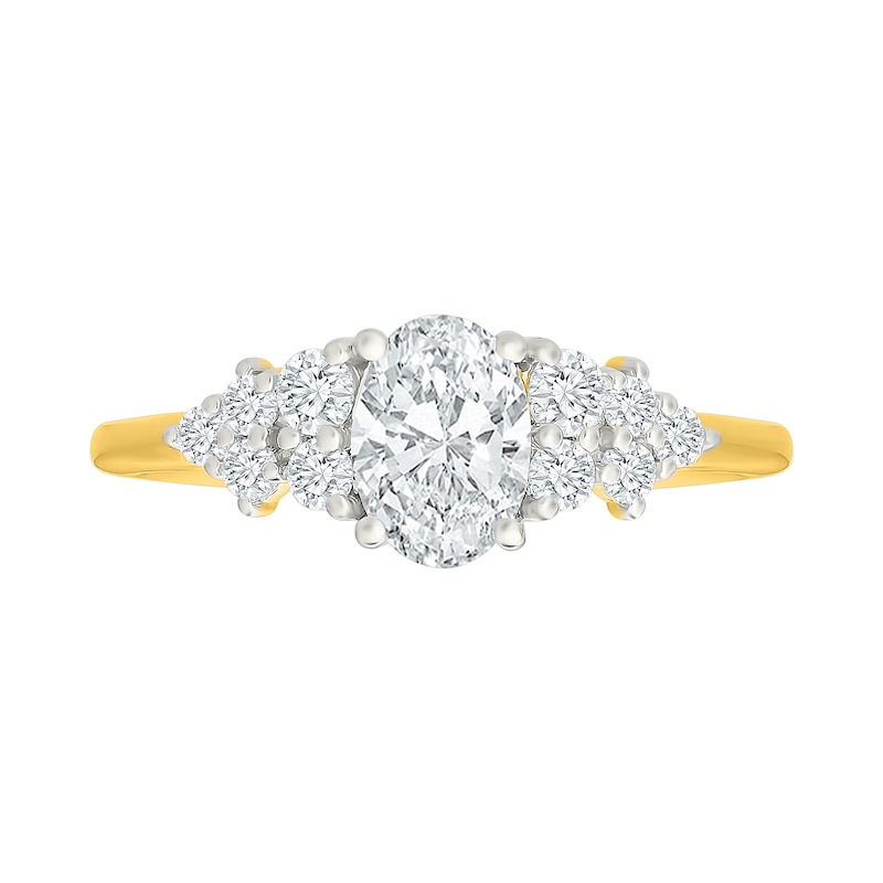 1.23 CT. T.W. Oval Certified Lab-Grown Diamond Cluster Bridal Set 10K Gold (F/VS2)