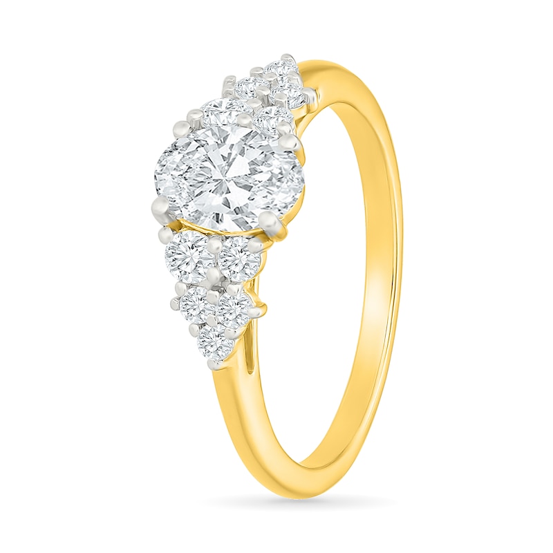 1.23 CT. T.W. Oval Certified Lab-Grown Diamond Cluster Bridal Set 10K Gold (F/VS2)