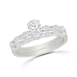 0.95 CT .T.W. Oval Certified Lab-Grown Diamond Bridal Set in 10K White Gold (F/VS2)