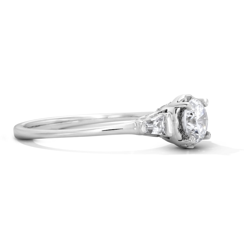 0.70 CT. T.W. Round and Baguette-Cut Diamond Engagement Ring 14K White Gold (I/I1)