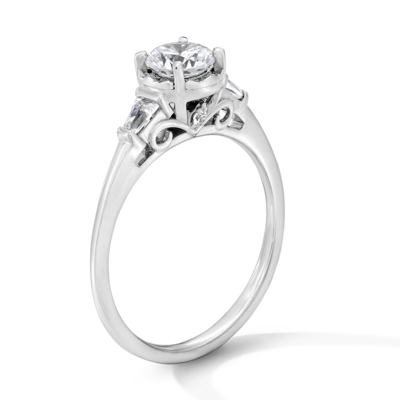0.70 CT. T.W. Round and Baguette-Cut Diamond Engagement Ring 14K White Gold (I/I1)