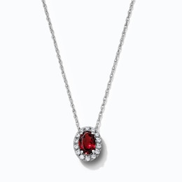 Oval-Cut Garnet and 0.10 CT. T.W. Lab-Grown Diamond Frame Necklace in Sterling Silver - 18"