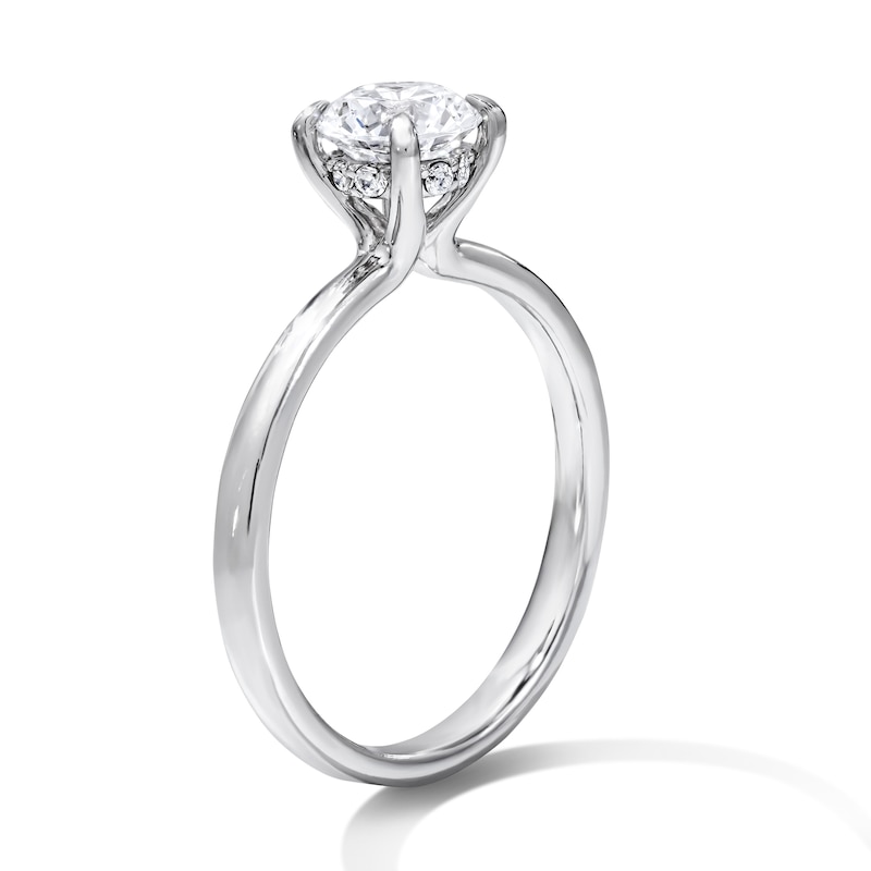 1.06 CT. T.W. Round Certified Center Diamond Solitaire Engagement Ring 18K White Gold (F/SI2)